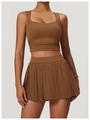 Detail of caramel brown tennis set featuring pleated mini skirt and ruched square neck top - S / 8782 Tank Top + 8782 Skirt / Birch Tea Brown