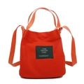 Minimalist canvas bucket bag in bright orange with adjustable crossbody strap - Orange