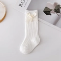 Detail of white cotton baby socks featuring cream bows, pearls and vertical knit texture - XS (0-1Y Foot: 8-10cm) / White