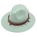 Detail of mint green fedora hat featuring ethnic woven band and metal coin ornaments - Mint Green