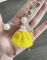 Handmade doll keychain featuring a white pearl head, pink top, and yellow sequin mesh skirt - 31-Yellow Sequin Mesh Doll