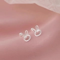 Silver rabbit stud earrings with flower details on a soft pink silk background - Rabbit Small Flower Style (A315)