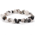 Elastic bracelet with irregular black and white natural stone chips on a white background - Black Rutilated Quartz