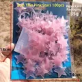 Package of 100 pink 3cm glow in the dark star wall stickers with adhesive pads - Thin Version/100 Pieces/Card Pack / 3cm/Glow / Pink