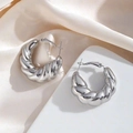 Modern twisted croissant stud earrings in polished silver stainless steel finish - 24K / Silver