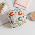 Quilted floral sanitary pouch with abstract patterns for travel and makeup storage - Colorful U-Pattern