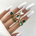 Close-up of bohemian gold rings with heart, butterfly and yin yang patterns on hand - Bohemian Gold 6-Piece Set (5481502)