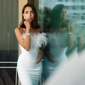 Elegant white strapless bodycon dress with feather trim detailing on the bust - S / White