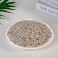 Mix of colorful natural crystal gravel in a white plate for aromatherapy decor - Rutilated Quartz (3-5mm) 100g