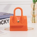 V-textured orange jelly mini bag with gold chain strap and top handle in PVC material - Orange