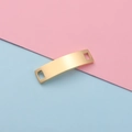 Conector rectangular de oro pulido con dos agujeros cuadrados sobre fondo bicolor - Oro de 18K