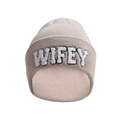 Detail of light pink knitted beanie featuring white fuzzy WIFEY embroidery texture - Beige