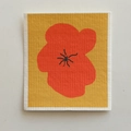 Square compressed wood pulp sponge with orange floral pattern on yellow fiber background - Peach Blossom