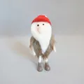 Close-up of handmade felt Christmas gnome with red knit hat and soft white beard - Plush Santa Claus (8*18CM) / Red