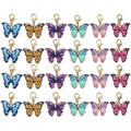 Set of 24 colorful alloy butterfly charms with gold lobster clasps in six assorted colors - Multicolor