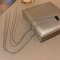 Detail view of multilayer silver chains hair accessory on champagne jewelry box - 1pc 6-Row Bead Chain Style