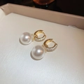 Elegant gold earrings with round white pearl and sparkling crystals on a beige tray - Gold Pearl Ear Clip (21#)