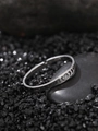 Macro shot of silver lunar phase engraved ring placed on a dark stone background - Moon Phase Style (NR306)