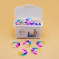 50pcs multi-effect laundry detergent pods in a 5-color flower shape and plastic container - Trending 6-Cavity 50 Pods/Box