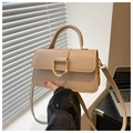 Detail view of a beige PU leather square bag featuring a distinctive metal D-ring buckle - Khaki