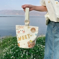 Cream canvas bucket bag with sweet animal prints and stylish wooden ring handles - Rabbit Bear Duck