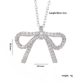 Silver bow pendant necklace in copper with sparkling cubic zirconia on a white background - Bow-knot Silver Style (889)