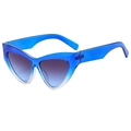 Modern blue cat-eye sunglasses with gradient lenses shown from a 45-degree side angle - Blue Frame Gray Blue Lens