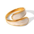 Detailed view of irregular gold-plated stainless steel ring with white enamel inlay - White Enamel Wrap-around Art Ring (HC-R30429-WT)