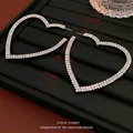 Silver-colored heart-shaped hoop earrings featuring two rows of white sparkling zircons - Silver Oversized Rhinestone Pave Hollow Heart Hoops