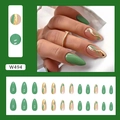Green almond-shaped press-on nails featuring gold ripple designs and a glossy finish. - Fresh Ribbon (W494)