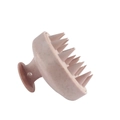 Detail showing wheat straw material texture and soft silicone bristles of scalp massage brush - Light Pink (Wheat Straw)
