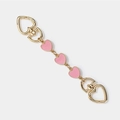 Golden pearl bag extender chain featuring pink enamel hearts and spring ring clasps - Pink