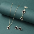 Macro shot of gold necklace, bracelet, and earrings with black clover and crystals - Gold Base Black Five-Petal Flower Style (XL-H-75)
