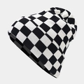 Close-up of black and white checkerboard knit beanie with thick thermal texture - Black White Grid