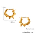 Modern gold titanium steel earrings featuring a fluid irregular molten wave design - Streamlined Lava Texture Gold Earrings