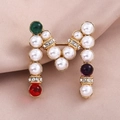 Golden M letter brooch with colorful gemstones and pearls on beige texture - Gold Letter M Pearl Colorful Gem (XD11180)