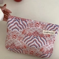 Vintage Chinese style brocade toiletry bag with red and blue wave pattern and zip closure - Soaring Clouds