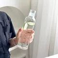 Bottiglia d'acqua in vetro 500ml trasparente con scala graduata del tempo nera - Piccolo (Trasparente)