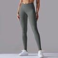 Detail showing high-waisted crossover waistband and ribbed texture on seamless yoga leggings - Dark Gray