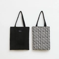 Minimalist canvas tote bags in solid black and heart print with wide shoulder straps - Black and White Heart