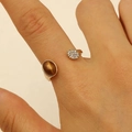 Golden open ring with brown tiger eye stone and crystal pavé detail on finger - Gold Open Brown Oval Gemstone Ring Style (11163)