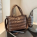 Metallic bronze quilted down nylon shoulder bag with wide strap and shiny finish - Brown