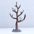 Brown rustic tree jewelry stand with two bird accents and a sturdy grey rock base - Brown
