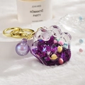 Purple cat paw acrylic liquid keychain with moving beads and golden metal ring - Bead Paw Style / Purple