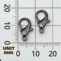 Pair of black zinc alloy lobster clasps for DIY jewelry making measured with a metric ruler - 14mm / Gunmetal