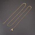 Detailed view of 18K gold plated cross chain with secure lobster clasp on black texture - Gold O-Chain Only (Without Pendant)