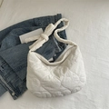 White quilted tote bag with knotted shoulder strap and cloud pattern design on fabric - Off White