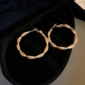 Detail of twisted rope gold hoop earrings presented in a black velvet jewelry box - Gold Twisted Small (69#)