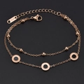 Double-layered rose gold titanium steel bracelet featuring roman numeral disc pendants - Rose Gold