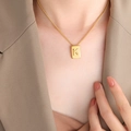 Elegant gold titanium steel necklace featuring a rectangular pendant with embossed letter K - Letter K Style (P1506-K)